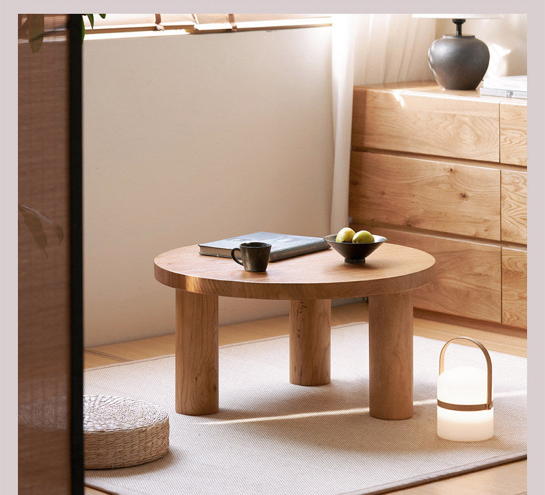 Elm Solid Wood Round Tea Table with Wind-Inspired Design