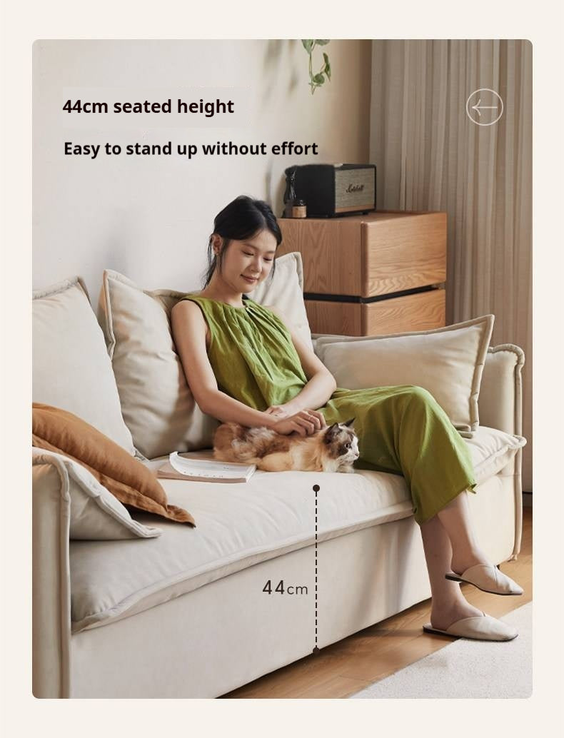 Cream-style washable fabric sofa with relaxed silhouette