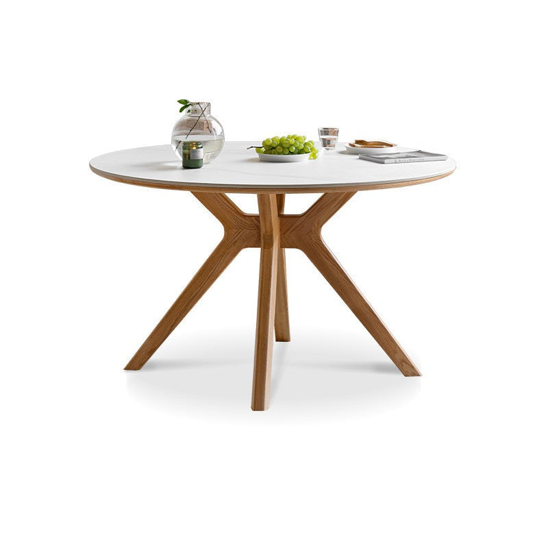 Round Nordic oak dining table with rock slab surface-