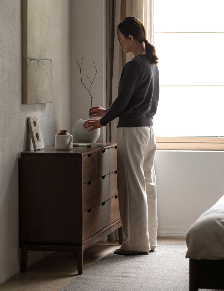 Ash Solid Wood Storage Cabinet Against the Wall