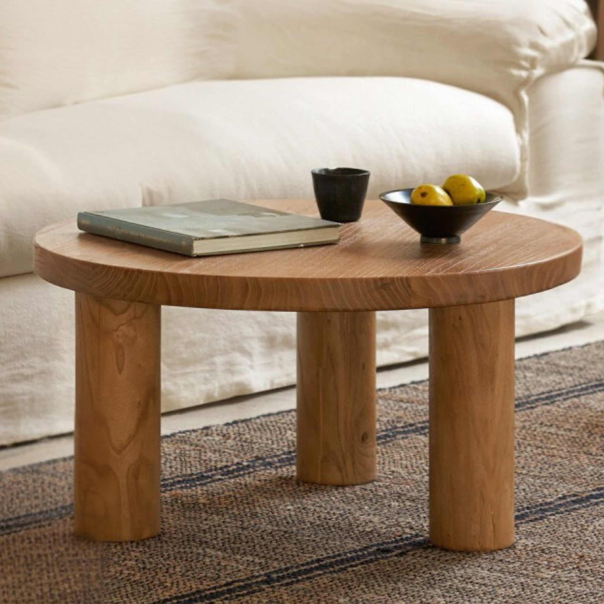 Elm Solid Wood Round Tea Table with Wind-Inspired Design
