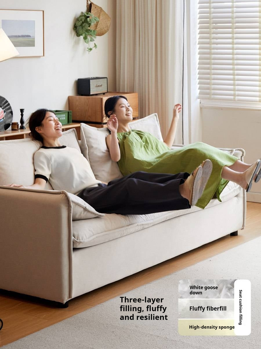 Cream-style washable fabric sofa with relaxed silhouette