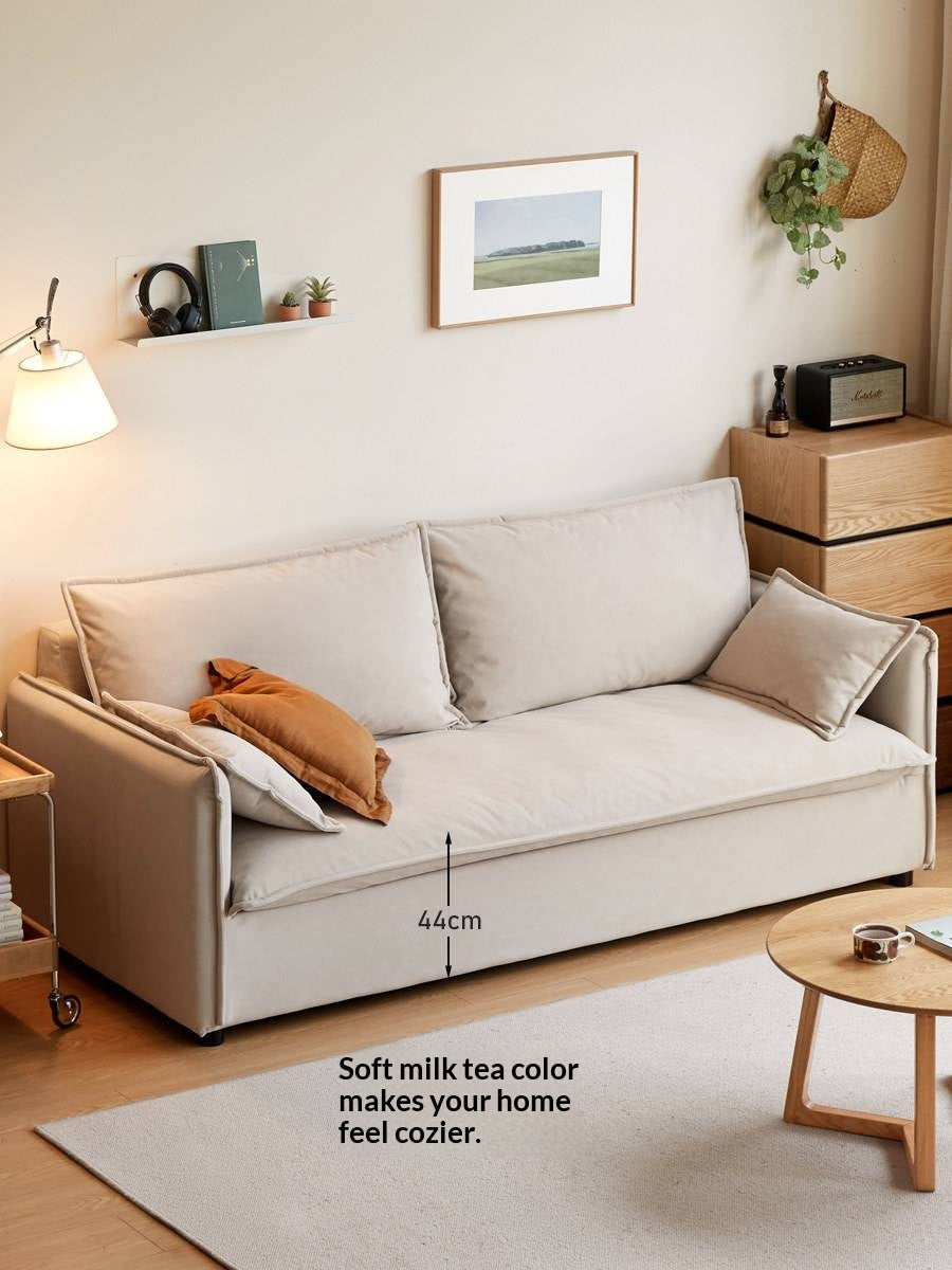 Cream-style washable fabric sofa with relaxed silhouette